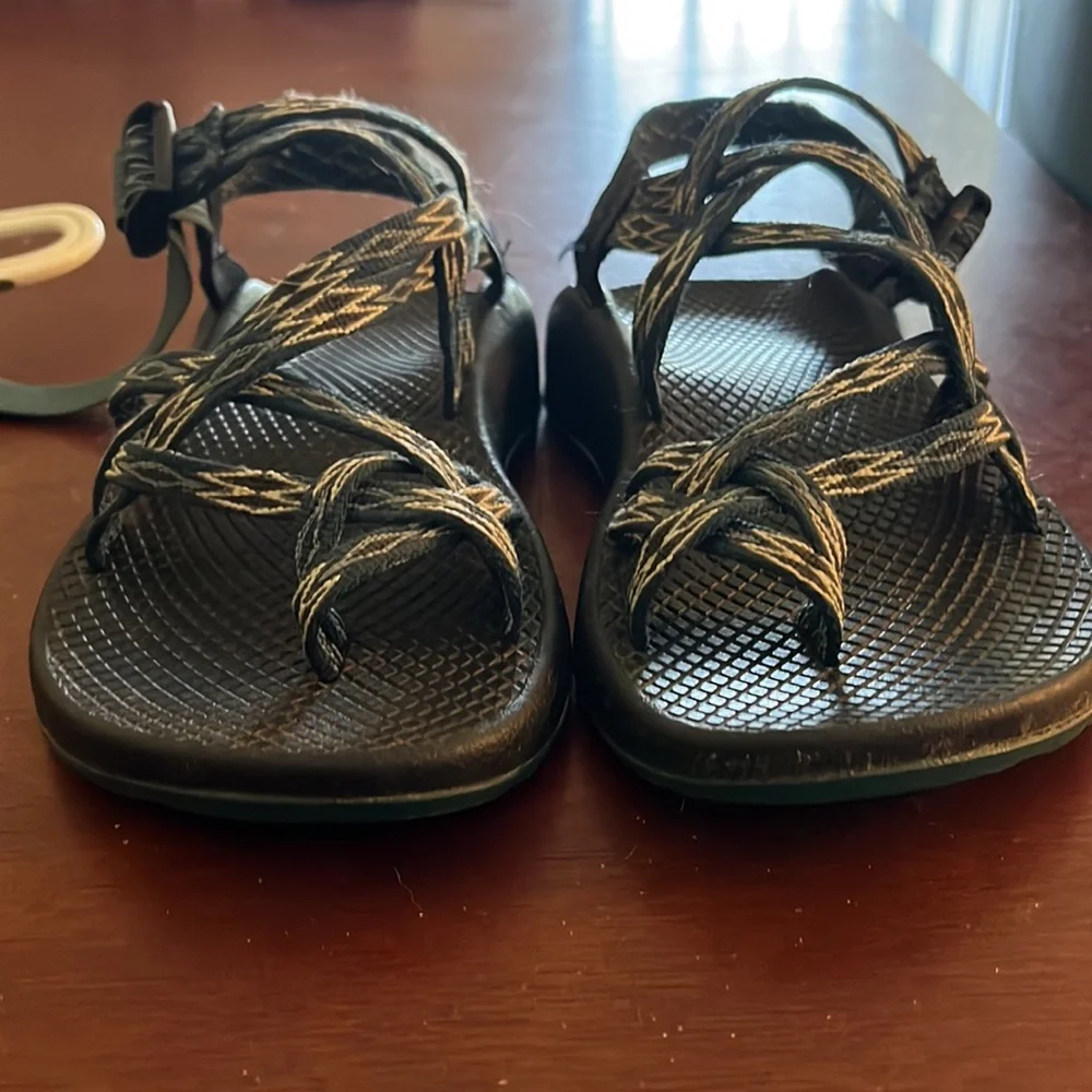 I loved these Chaco but bought another pair. These Chacos have a lot miles left. - Picture 7 of 7